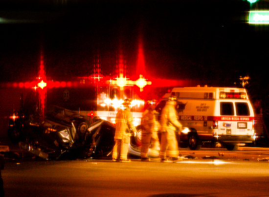 Firemen at a Car Accident