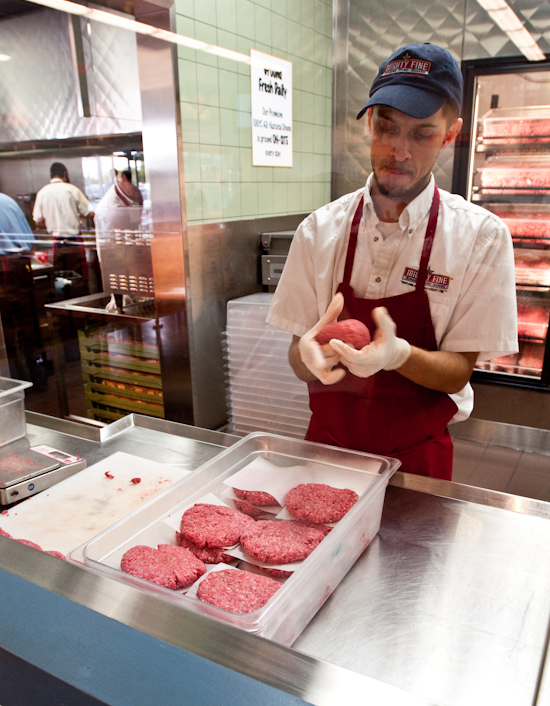 Mighty Fine Burgers - Fresh beef being formed into patties