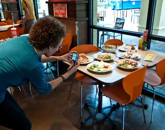 Zoe’s Kitchen - Addie Broyles of the Austin American-Statesman takes a picture of sample food