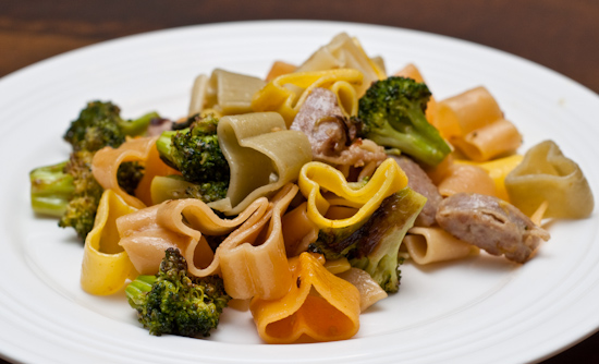 Pasta with bratwurst, roast broccoli, and NatureSweet SunBursts tomatoes