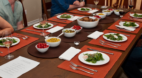 Wilted Spinach Salad and Sides on Table