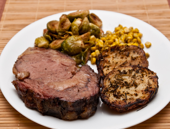 Prime Rib, Brussels sprouts, corn, and potatoes