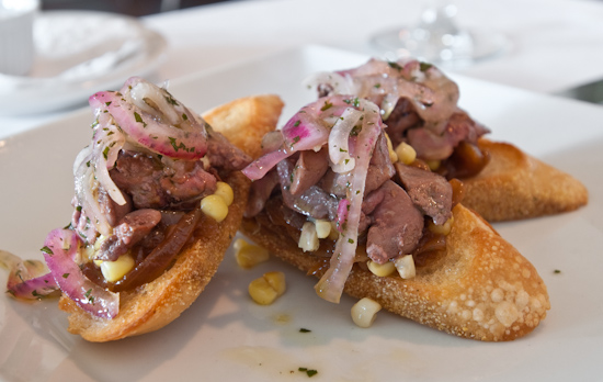 Zoot - Seared quail livers on toast with caramelized onion jam, sweet corn and fresh thyme