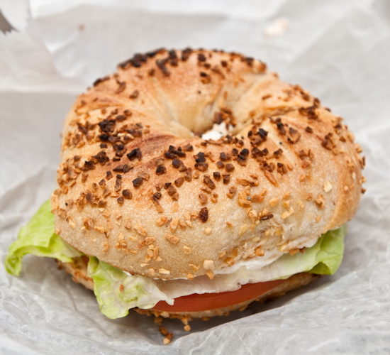 Absolute Bagels - Toasted Garlic Bagel with Lox Spread and Tomatoes and Lettuce