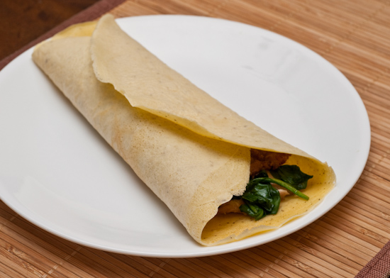 Crepe wrapped around shredded chicken, sauteed spinach, and Cholula hot sauce