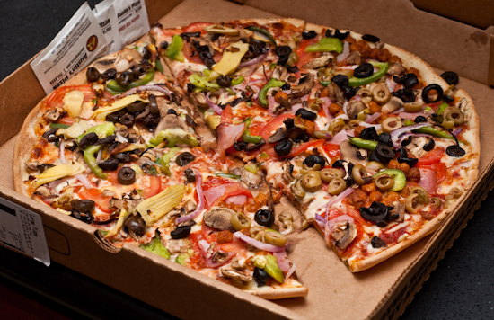 Austin's Pizza - Half MoPac and half Farmer's Market Pizza