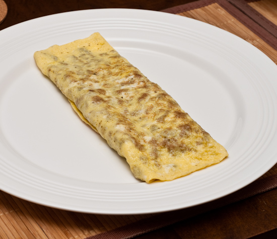 Breakfast sausage and artichoke omelet