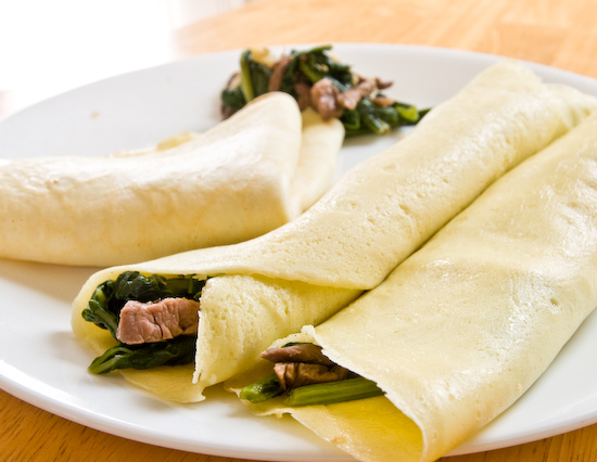 Crepes filled with turnip greens and beef