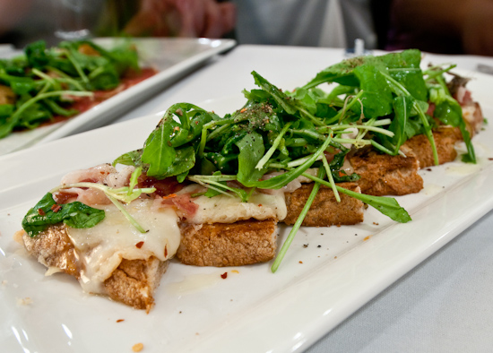 Soleil - Bruschetta of Taleggio & Pears with Proscuitto & Arugula
